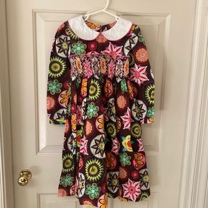 Brand new cotton dress with embroidery on the chest.